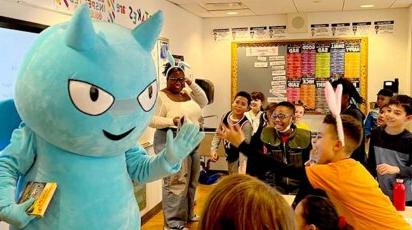 Lower School Blue Devil high-fiving Students